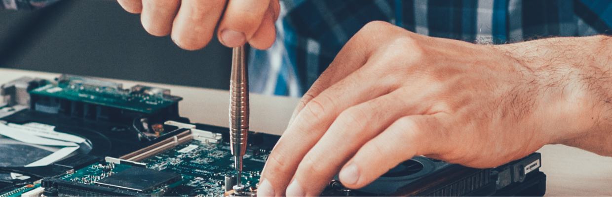 A person assembling electronics